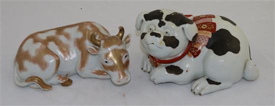 A Japanese Kutani model of a puppy and a similar model of a cow, late 19th century, 20.5 and 21.5cm, cow restored